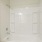 a bathroom with a bathtub and toilet