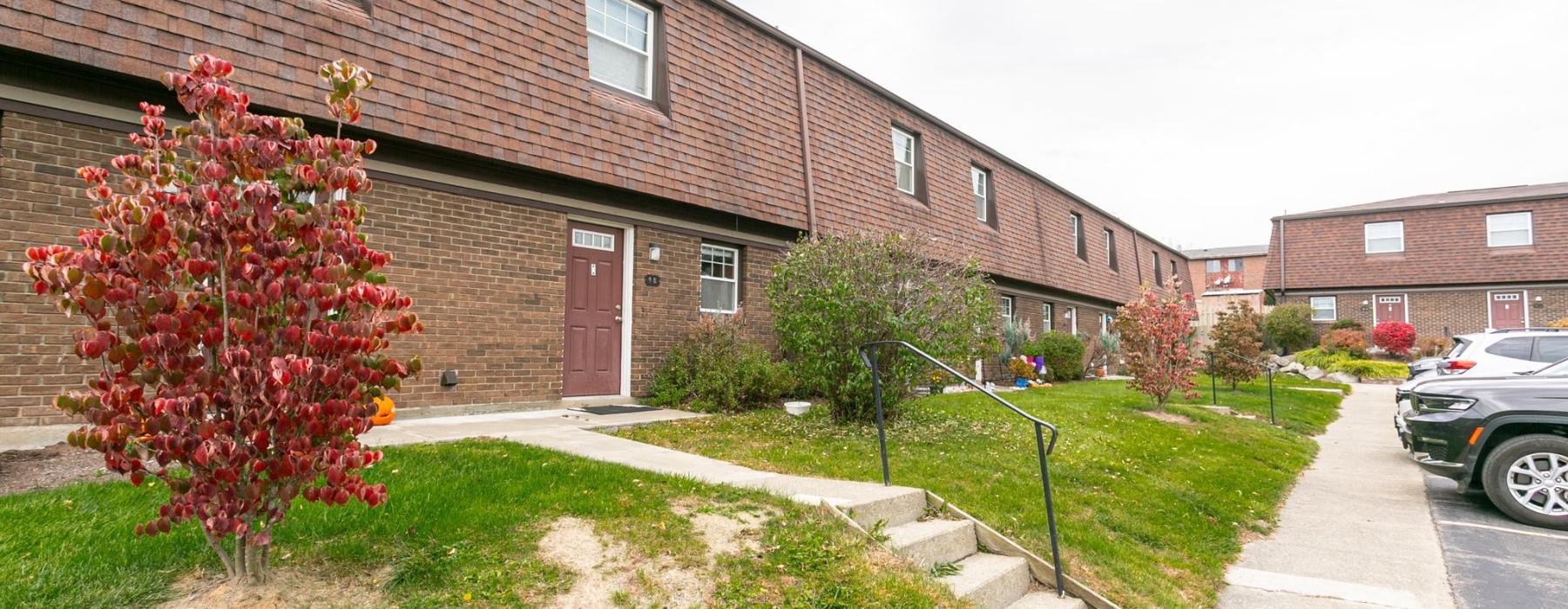 a brick building with a driveway