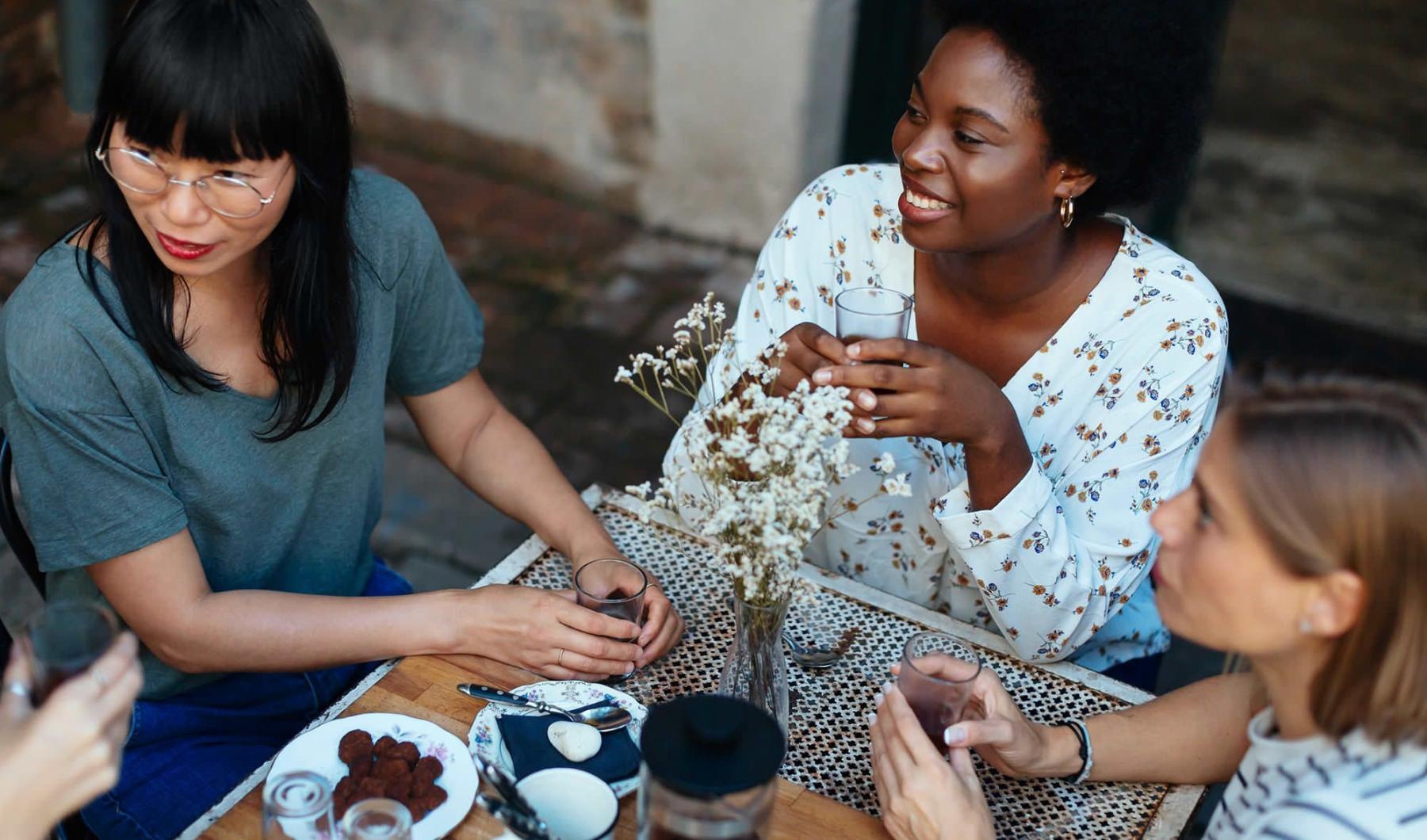 Vibrant community life with a variety of dining options group of women having brunch at a neighborhood restaurant